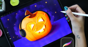 a person drawing a pumpkin on a tablet showing digital pumpkin drawing 